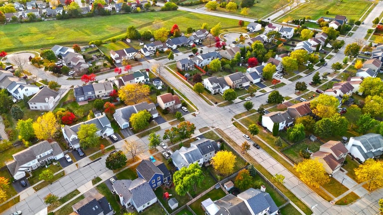 Aerial view of suburban neighborhood in autumn